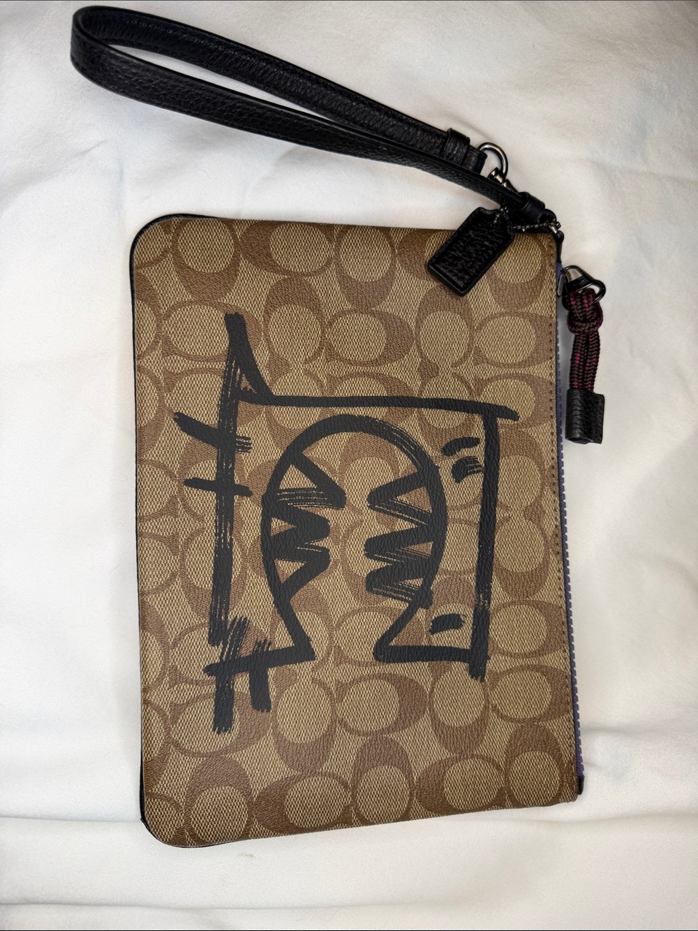 Coach Brown Signature Canvas Wristlet with Black Graphic and Black Strap